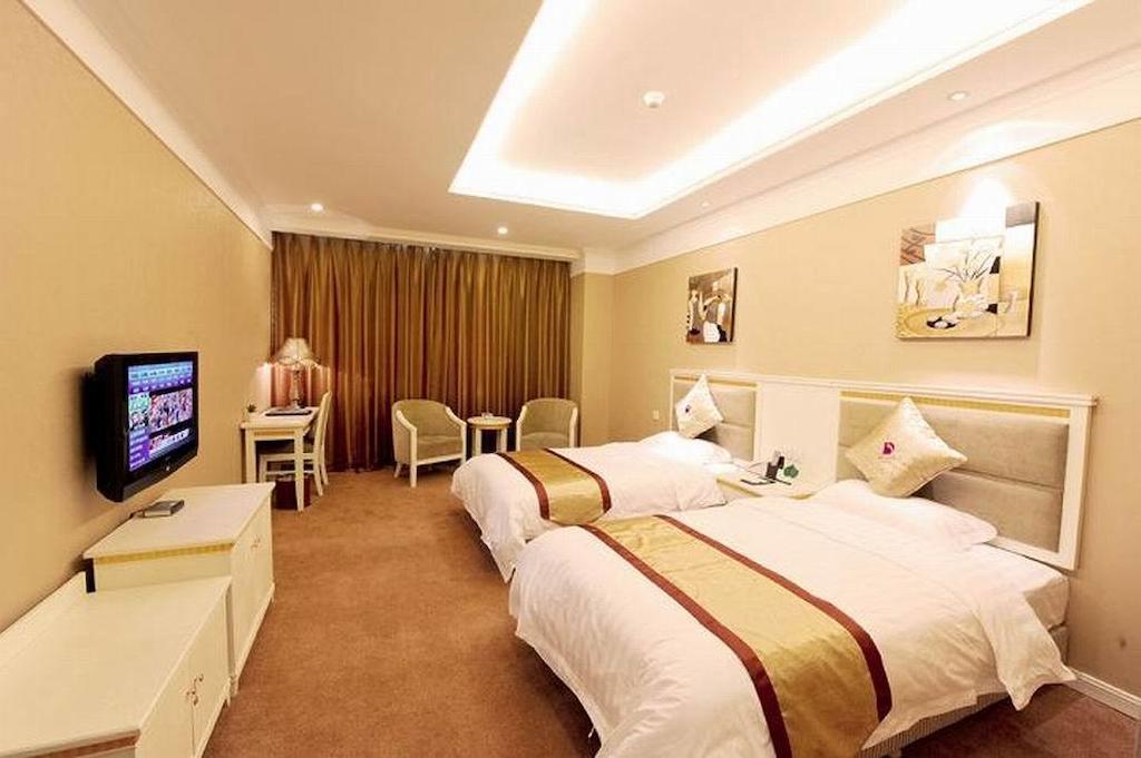 Dragon Hotel Чунцін Номер фото